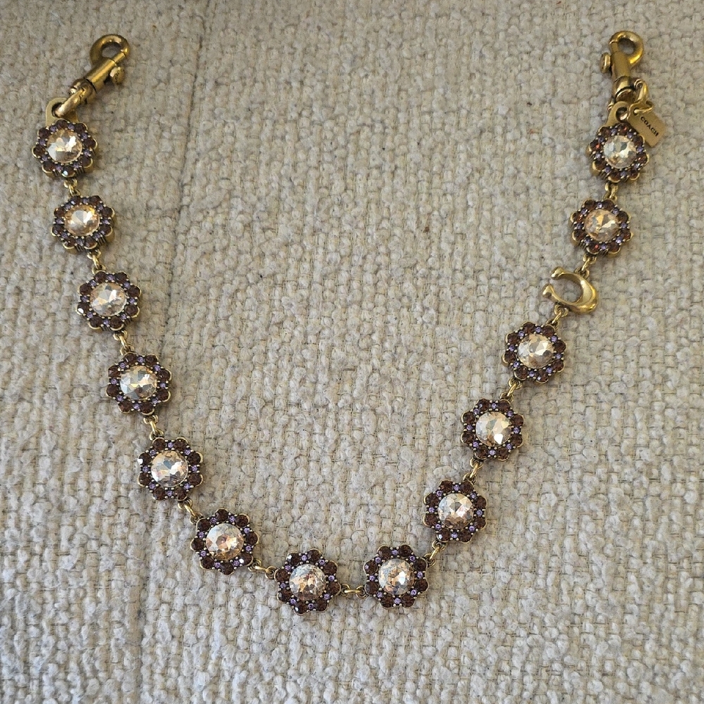 COACH Gold And Rose purse Charm/chain